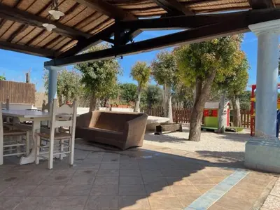 Area soggiorno di Orosei RE - Villa Samuela a 50 m dal mare