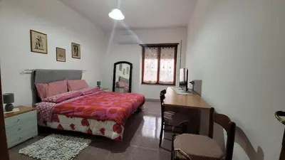 Letto o letti in una camera di Holiday Maria Luisa