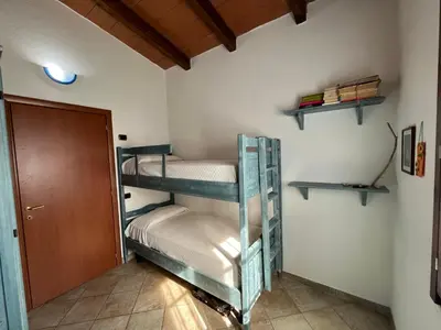 Letto o letti in una camera di Casa Costera