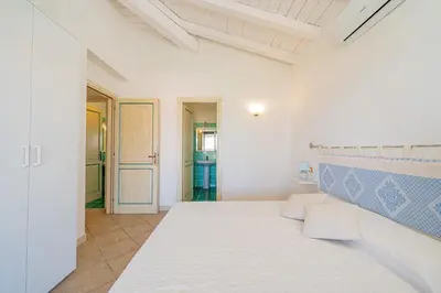 Letto o letti in una camera di Casa Lola by Wonderful Italy