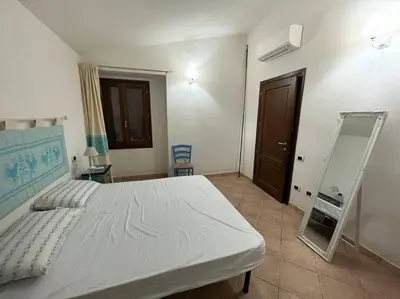 Letto o letti in una camera di Villa Azzurra sul mare