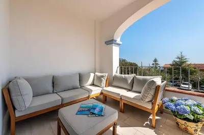 Area soggiorno di Holiday home in Stintino 23209
