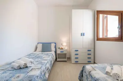 Letto o letti in una camera di Holiday home in Stintino 23209