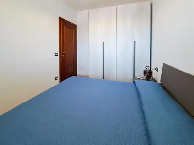 Letto o letti in una camera di Appartamento Trilocale vicino al centro di San Teodoro