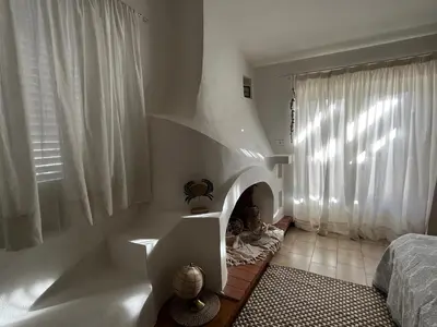 Letto o letti in una camera di Cala Gonone Holiday Flats