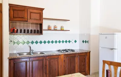 Cucina o angolo cottura di 1 Bedroom Pet Friendly Home In Orosei