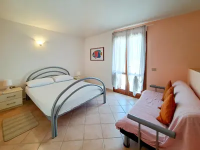 Letto o letti in una camera di Appartamento Residenziale Trilocale Aresula San Teodoro