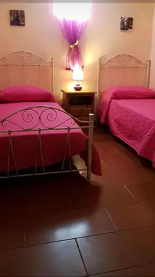 Letto o letti in una camera di Casa vacanze Nietta