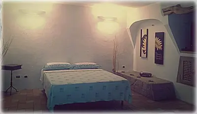 Letto o letti in una camera di Sardegna casa a 250 metri dal mare con piscina