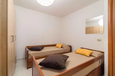 Letto o letti in una camera di Holiday home in Cala Gonone Nuoro Provinz 43626