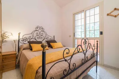 Letto o letti in una camera di Holiday home in Cala Gonone Nuoro Provinz 43626