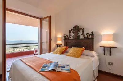 Letto o letti in una camera di Holiday home in Cala Gonone Nuoro Provinz 43625