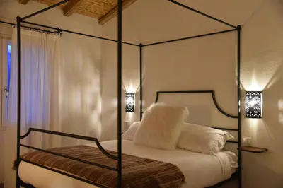 Letto o letti in una camera di Auberge Santu Martine: cottage with pool (Vinza)
