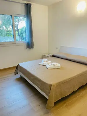 Letto o letti in una camera di CHRISSO ROOMS affittacamere