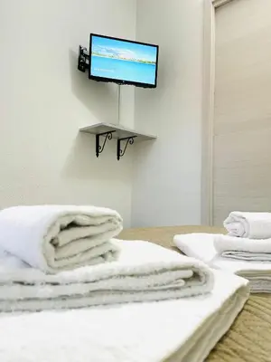 Letto o letti in una camera di CHRISSO ROOMS affittacamere