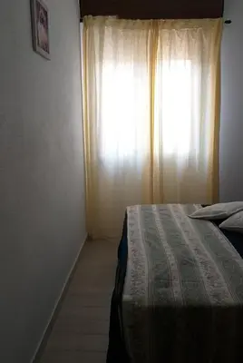 Letto o letti in una camera di Casa vacanze Fenu