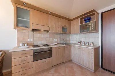 Cucina o angolo cottura di AffittaSardegna-Casa Del Golfo