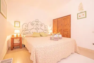 Letto o letti in una camera di Casa Turchese