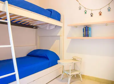 Letto o letti in una camera di Casa Ariel - Cala Gonone