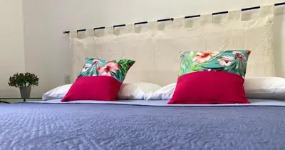 Letto o letti in una camera di Casa Amalia