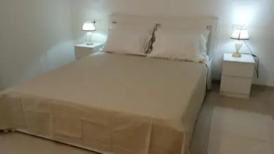 Letto o letti in una camera di Sea & Country Rooms Porto Rotondo Golfo Aranci