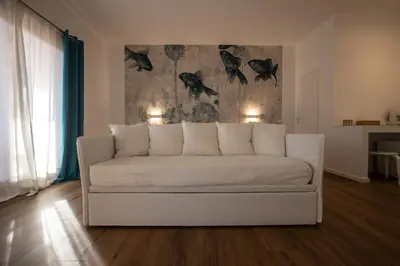 Area soggiorno di Il Borgo Boutique Rooms by KasaVacanze