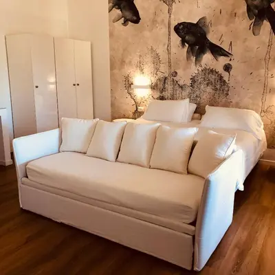 Area soggiorno di Il Borgo Boutique Rooms by KasaVacanze