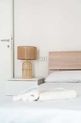 Letto o letti in una camera di Villetta 5 La Caletta