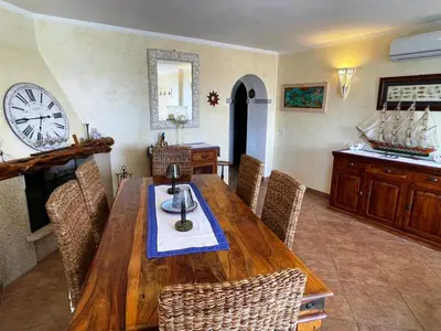 Area soggiorno di Sandy Cove Patio Villa sul Mare