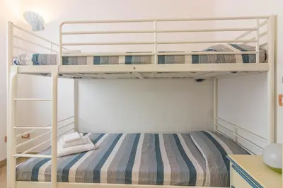 Letto o letti in una camera di GuestHost - Amazing Sea View Flat with Swimming Pool!
