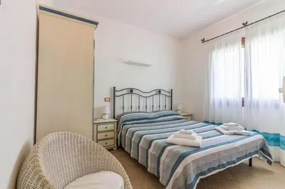 Letto o letti in una camera di GuestHost - Amazing Sea View Flat with Swimming Pool!
