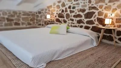 Letto o letti in una camera di Lo Stazzo della Dottoressa
