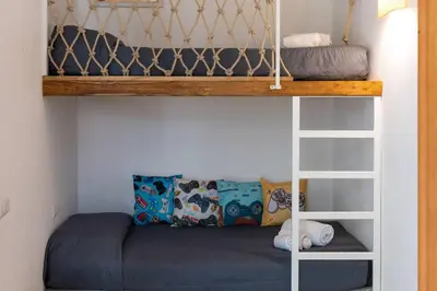 Letto o letti in una camera di Resort family apartament