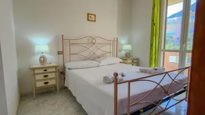 Letto o letti in una camera di Appartamento l'Ulivo