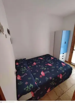 Letto o letti in una camera di Casa Flamingo House