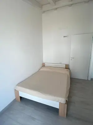 Letto o letti in una camera di Villetta 4 La Caletta