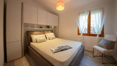 Letto o letti in una camera di Casa Valentina 6 Emma Villas