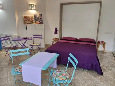 Letto o letti in una camera di Villa Alberto