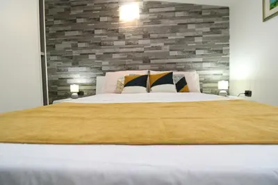 Letto o letti in una camera di Corona's Apartment- Fronte Spiaggia