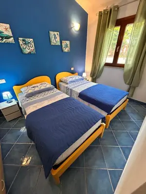 Letto o letti in una camera di Frank's Home