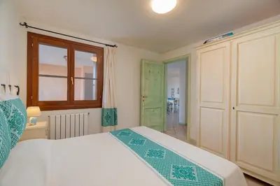 Letto o letti in una camera di Casa Susy by Wonderful Italy