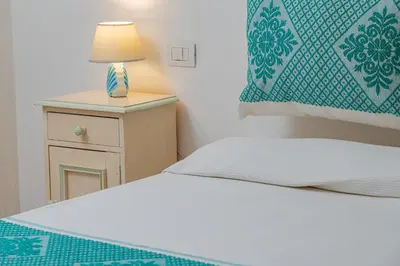 Letto o letti in una camera di Casa Susy by Wonderful Italy