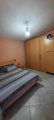 Letto o letti in una camera di Casa Orosei Mannu