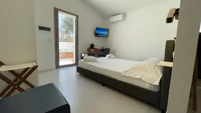 Letto o letti in una camera di La Casa dei Nonni