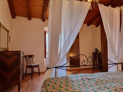 Letto o letti in una camera di Casa Monte Rena