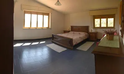 Letto o letti in una camera di Casa Linda