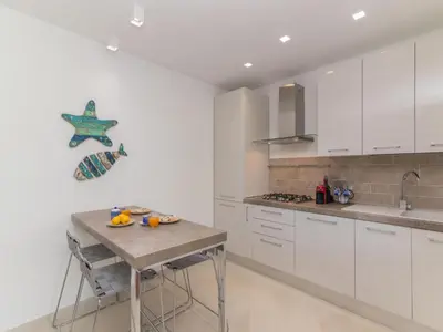 Cucina o angolo cottura di Apartment Lidia Capo Ceraso resort by Interhome