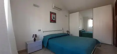 Letto o letti in una camera di Splendido appartamento Parco F. Noce