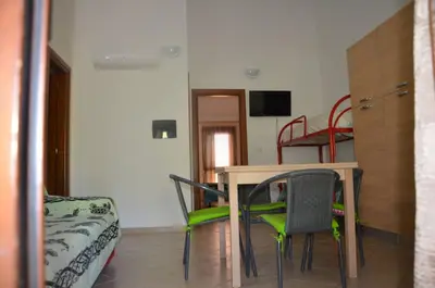 TV o dispositivi per l'intrattenimento presso FAN SARD Villetta 10 posti letto FBU-ZAN01