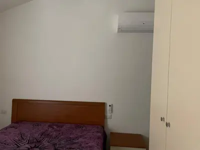 Letto o letti in una camera di FAN SARD Villetta 10 posti letto FBU-ZAN02